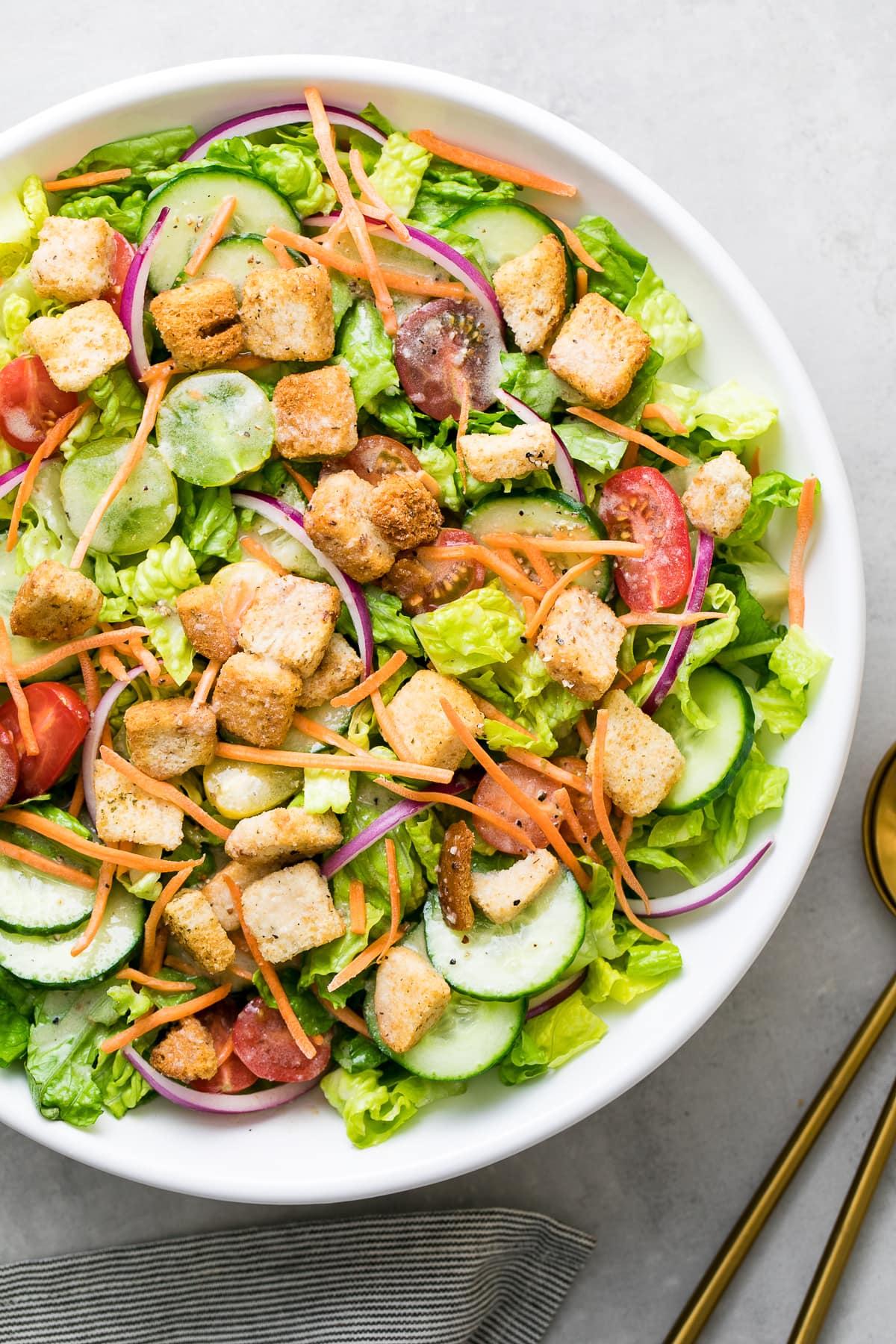 top down view of house salad with apple cider vinaigrette.