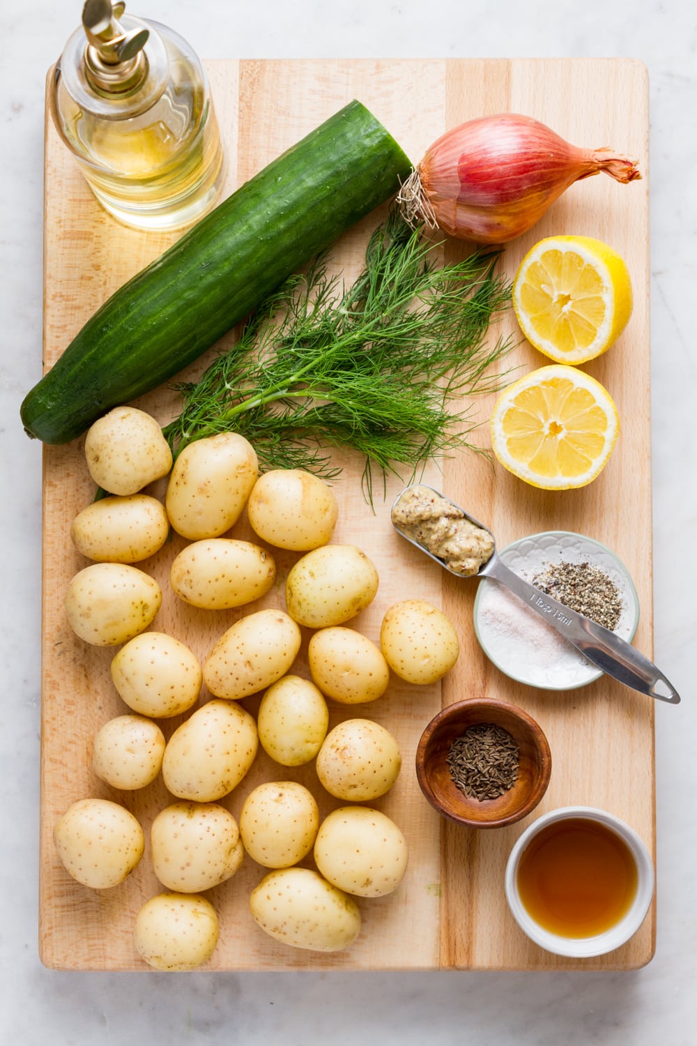 top down view of the ingredients needed to make vegan German potato salad.