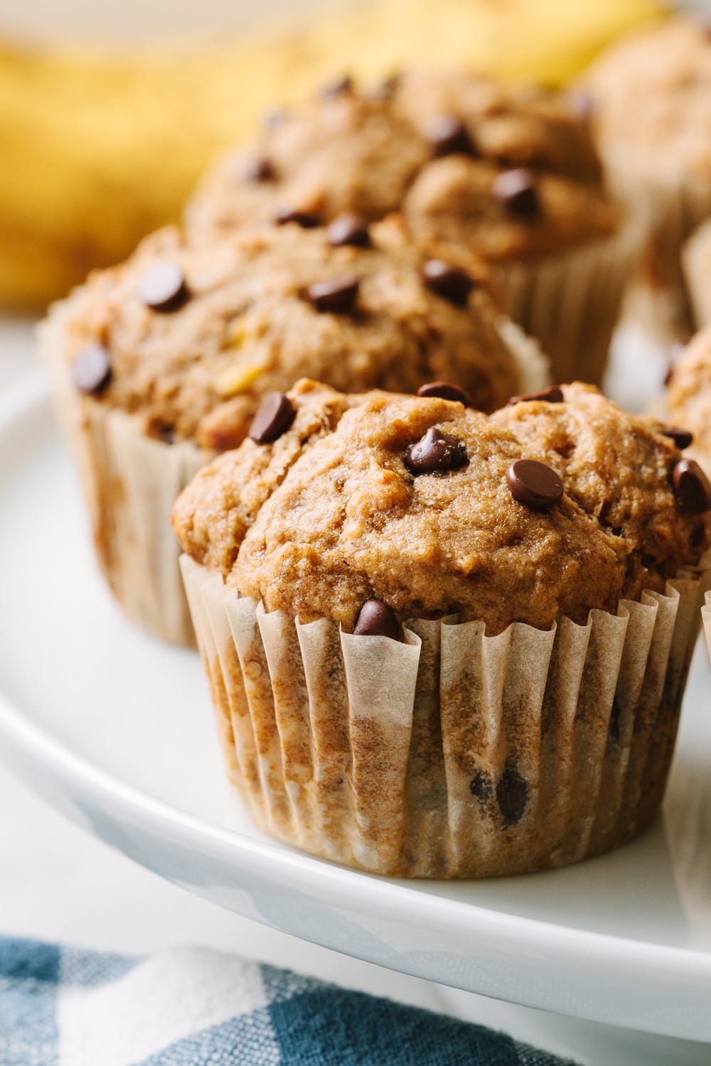 side angle view of a group of healthy vegan banana bread muffins.