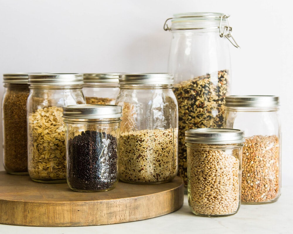 mason jars filled with various types of grains.