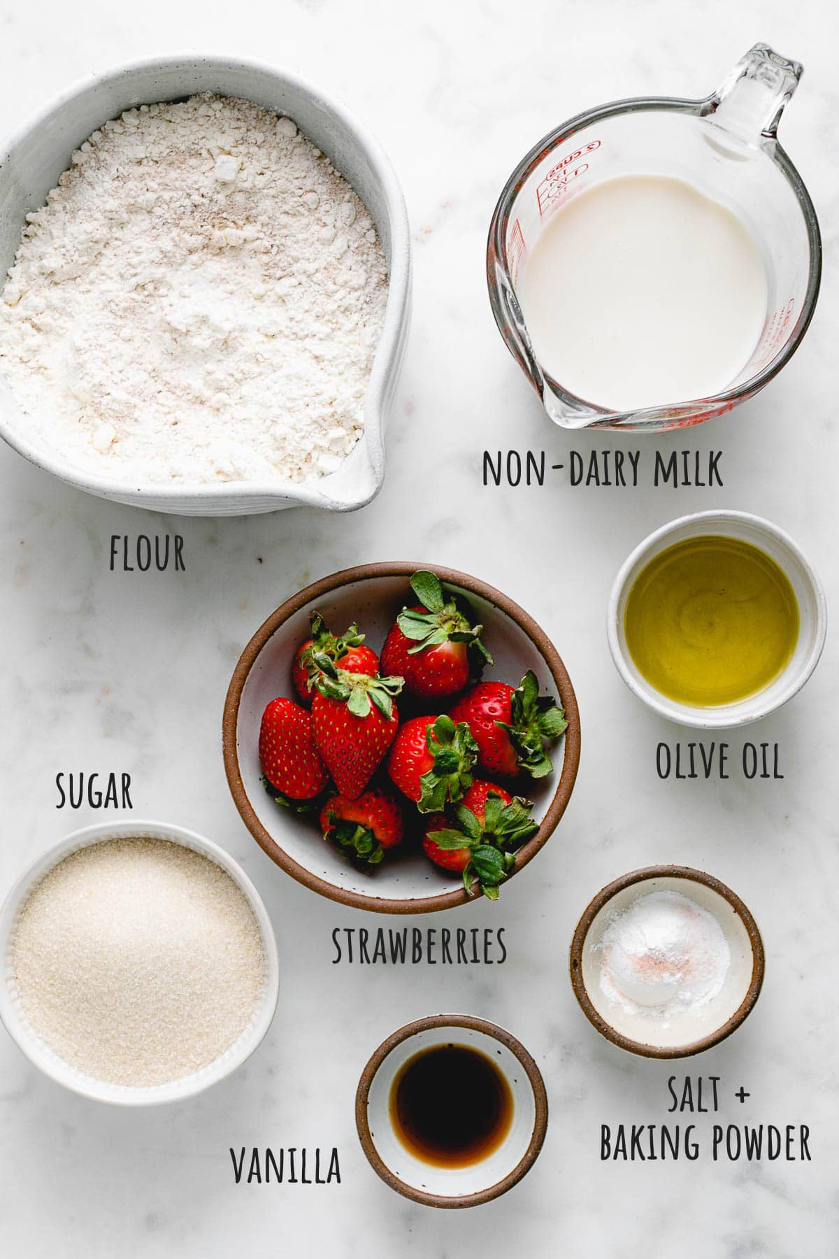 top down view of ingredients used to make healthy strawberry muffins recipe.